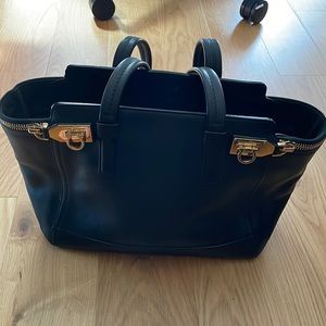 Black leather ferragamo purse